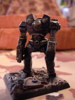 Specialised siege robot from early days of 40K. It's missing the weapon on the back, because I converted this as a part of a fantasy battle project... that never got anywhere, as you might have guessed.