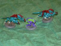 I got a pile of mildly damaged gaunts in a batch of 2nd hand tyranids I bought, so I decided to use them as color scheme samplers. The middle one is a Kryomek Alpha Helion, though.