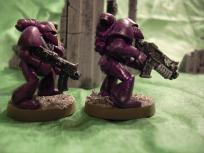 Some scrounging went into these figures - I had piles of bolt pistols, but very few bolters handy. Thus the brother marine on the right actually has a new model bolter. 