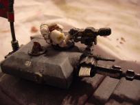 The commanders meltagun came from a GW robot model. The cat is from a Grenadier familiars set. The stupid clip is from a Tamiya flakvierling kit and the coax MG is a Dark Future gun.