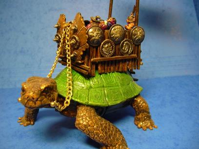 The howdah is scratch-built using matchsticks, plastic shields and the front piece is from a Grenadier war machine set.