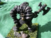 Back view. You might not see it, but the base is actually rather bent. At the time I was using Bostik contact glue for fixing metal miniatures to bases. Bostik has a high content of solvents (it's a classic favorite of glue-sniffers) and those solvents work havoc on the plastic bases. And it's not even very good glue! Oh why, oh why I didn't just buy 2-component epoxy glues?
