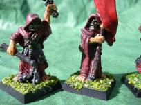 These were the last figures to be ruined by the bad varnish. After spending quite some time with these, I just completely swore off brush on varnish.