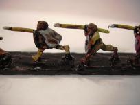 Yes, Watson, these are dipped. While I'd never subject, well not normally anyway, 28mm figures to such a treatment, these puppies seem to be built for it. This is mahogany shade, a darker dip might work better.