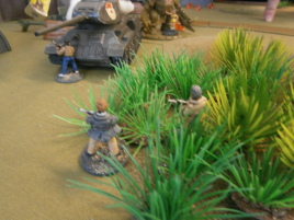 Hiding in the bushes.
